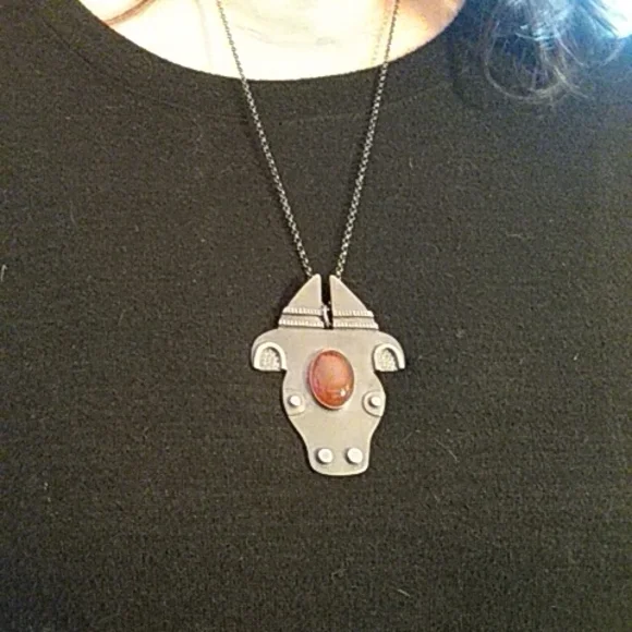 Amber stone bull pendant